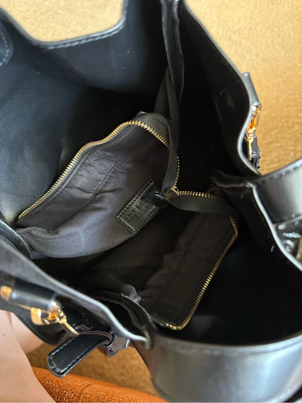 LIKE DREAMS Black Suede Shoulder Bag with Gold Accents